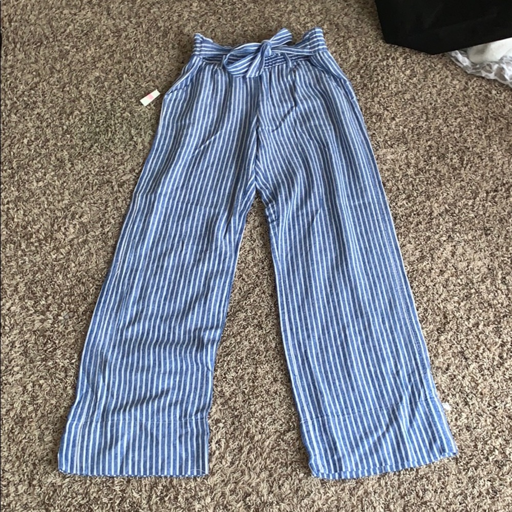 never been worn, medium fits more like extra large